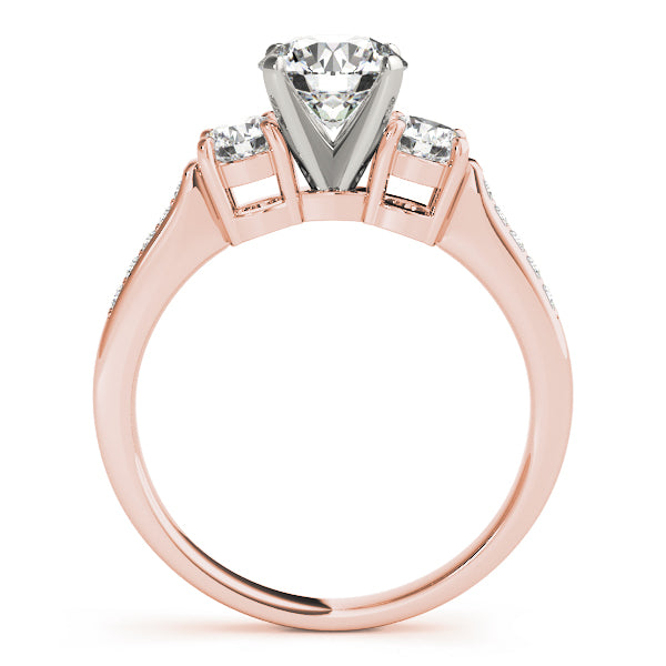 Round Three-Stone Diamond Engagement Ring · 0.34 ct tw