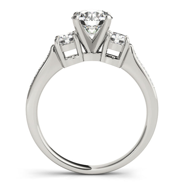 Round Three-Stone Diamond Engagement Ring · 0.34 ct tw