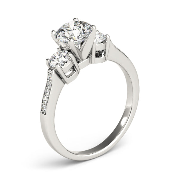 Round Three-Stone Diamond Engagement Ring · 0.48 ct tw