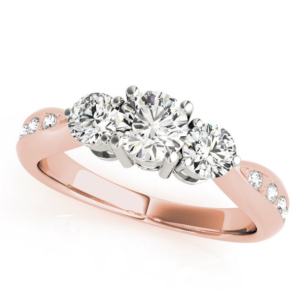 Round Three-Stone Diamond Engagement Ring · 0.79 ct tw