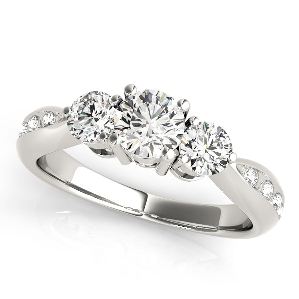 Round Three-Stone Diamond Engagement Ring · 0.79 ct tw