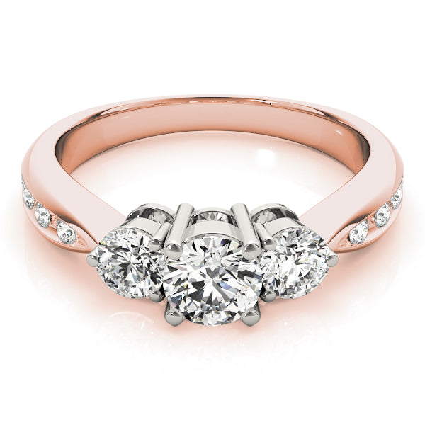 Round Three-Stone Diamond Engagement Ring · 0.79 ct tw