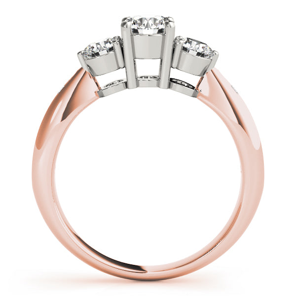 Round Three-Stone Diamond Engagement Ring · 0.79 ct tw