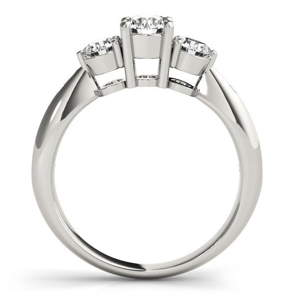 Round Three-Stone Diamond Engagement Ring · 0.79 ct tw