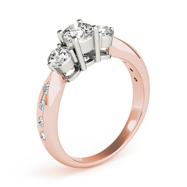 Round Three-Stone Diamond Engagement Ring · 0.79 ct tw