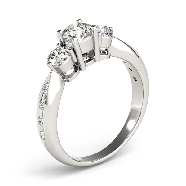Round Three-Stone Diamond Engagement Ring · 0.79 ct tw