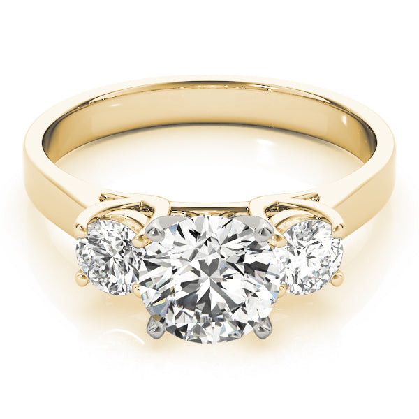 Round Three-Stone Diamond Engagement Ring · 0.20 ct tw
