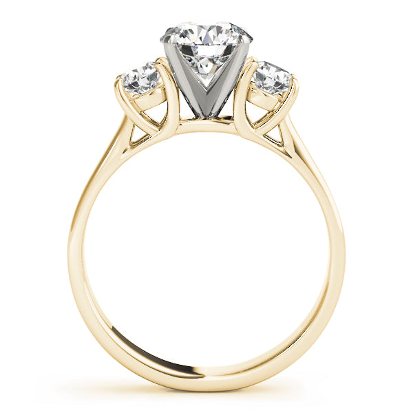 Round Three-Stone Diamond Engagement Ring · 0.20 ct tw