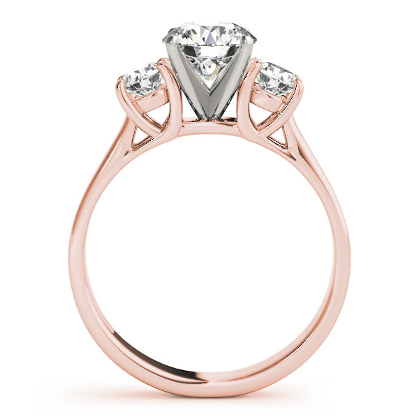 Round Three-Stone Diamond Engagement Ring · 0.20 ct tw