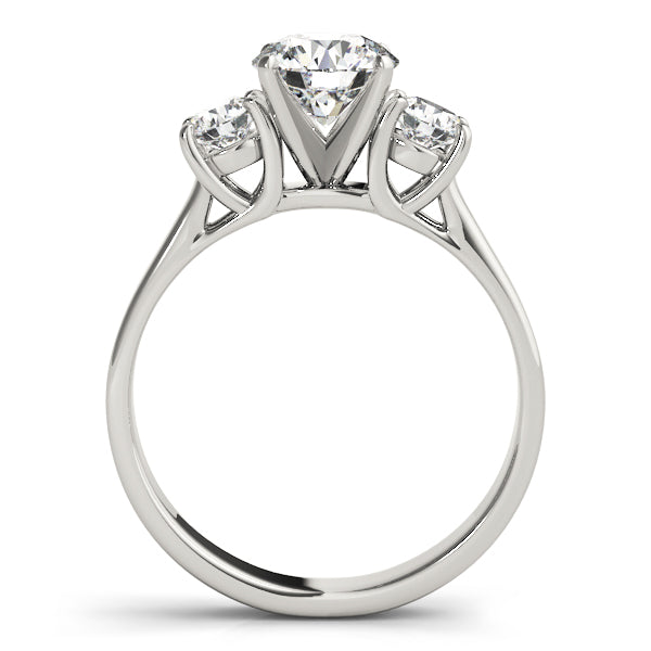 Round Three-Stone Diamond Engagement Ring · 0.20 ct tw
