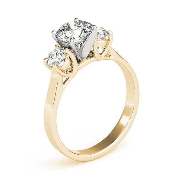 Round Three-Stone Diamond Engagement Ring · 0.20 ct tw