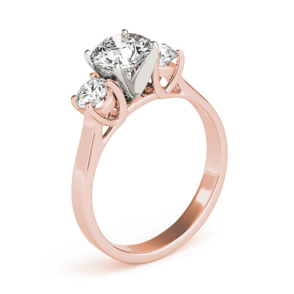 Round Three-Stone Diamond Engagement Ring · 0.20 ct tw
