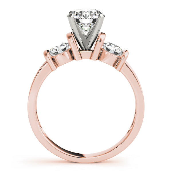 Round Three-Stone Diamond Engagement Ring · 0.50 ct tw