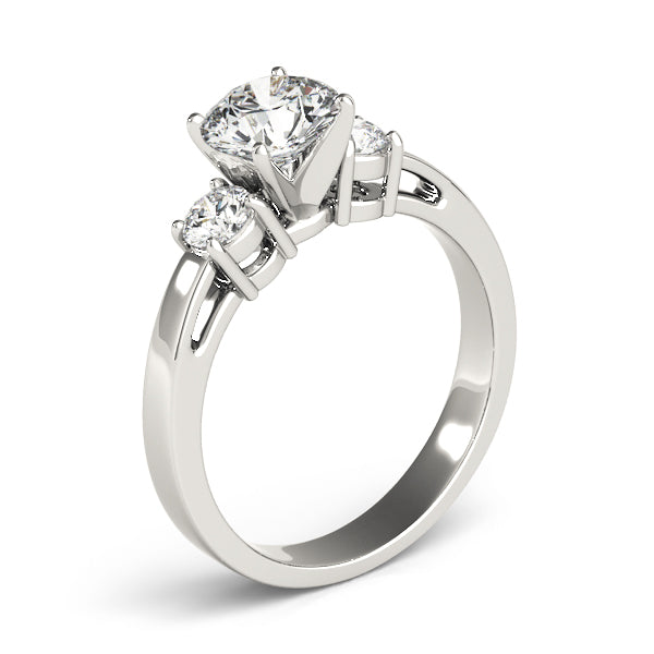 Round Three-Stone Diamond Engagement Ring · 0.40 ct tw