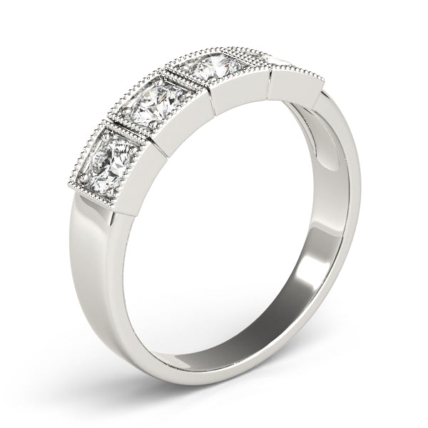 Round Three-Stone Diamond Engagement Ring · 0.36 ct tw