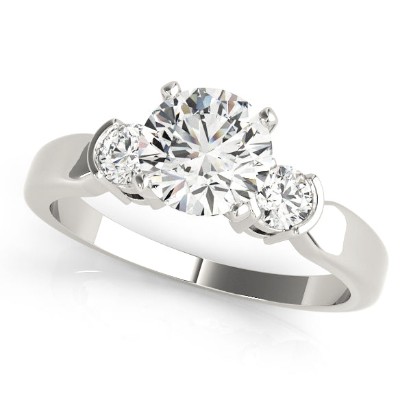 Round Three-Stone Diamond Engagement Ring · 0.24 ct tw