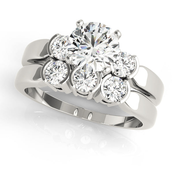 Round Three-Stone Diamond Engagement Ring · 0.24 ct tw