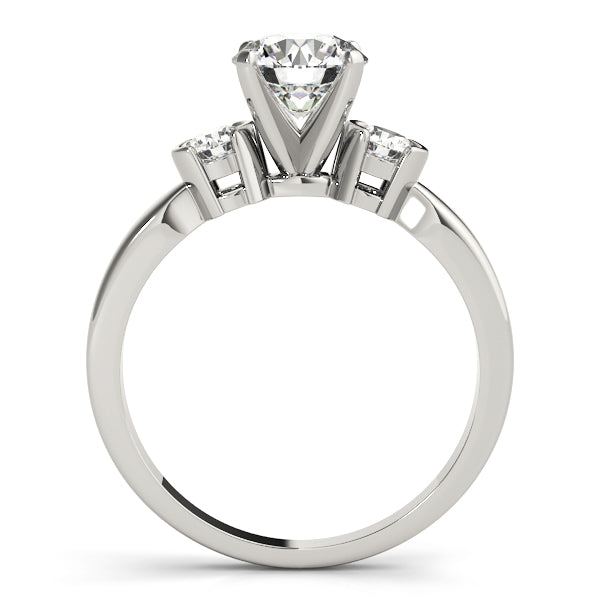 Round Three-Stone Diamond Engagement Ring · 0.24 ct tw