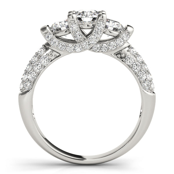 Round Three-Stone Diamond Engagement Ring · 0.89 ct tw