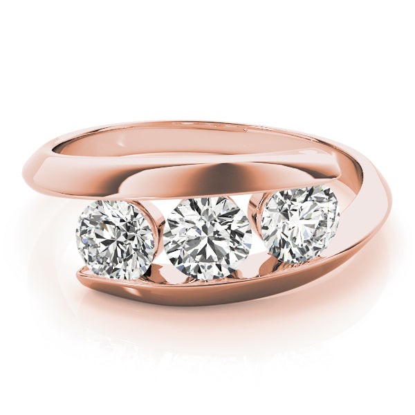 Round Three-Stone Diamond Engagement Ring · 0.24 ct tw