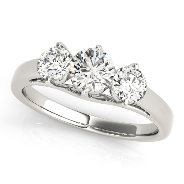 Round Three-Stone Diamond Engagement Ring · 0.25 ct tw