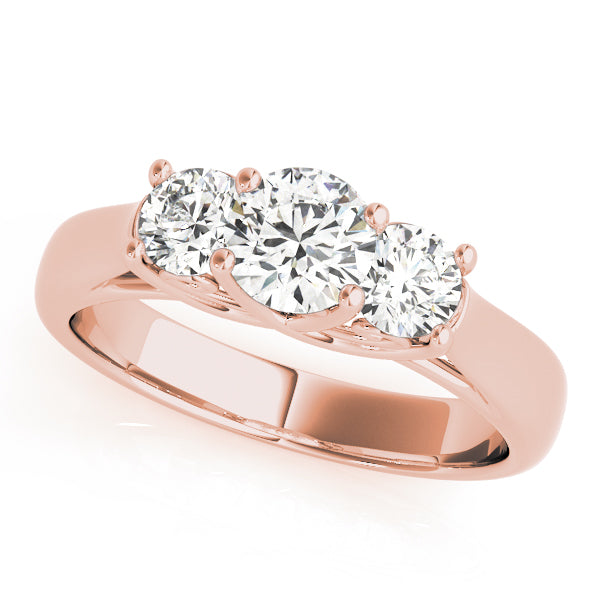 Round Three-Stone Diamond Engagement Ring · 0.49 ct tw