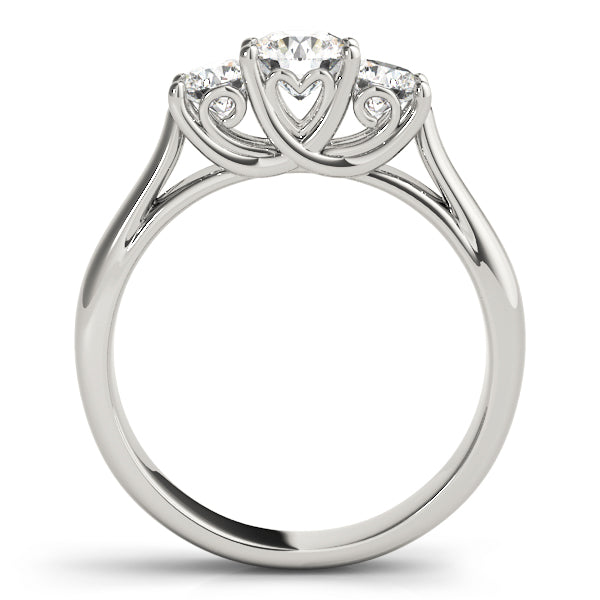 Round Three-Stone Diamond Engagement Ring · 0.24 ct tw