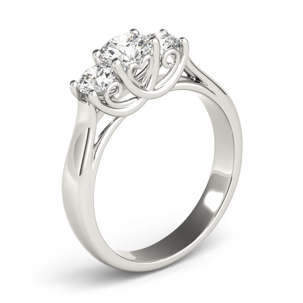 Round Three-Stone Diamond Engagement Ring · 0.24 ct tw