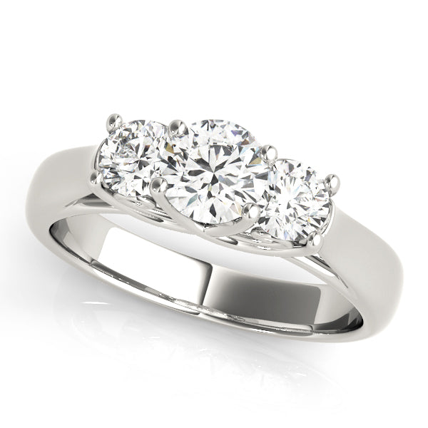 Round Three-Stone Diamond Engagement Ring · 0.24 ct tw