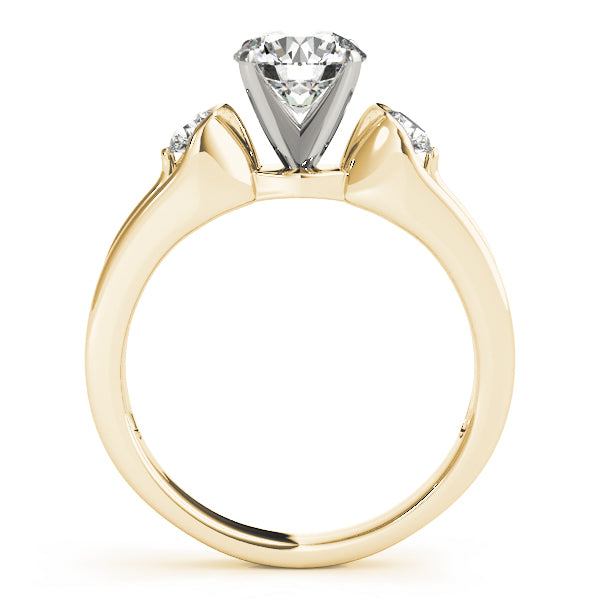 Round Three-Stone Diamond Engagement Ring · 0.20 ct tw