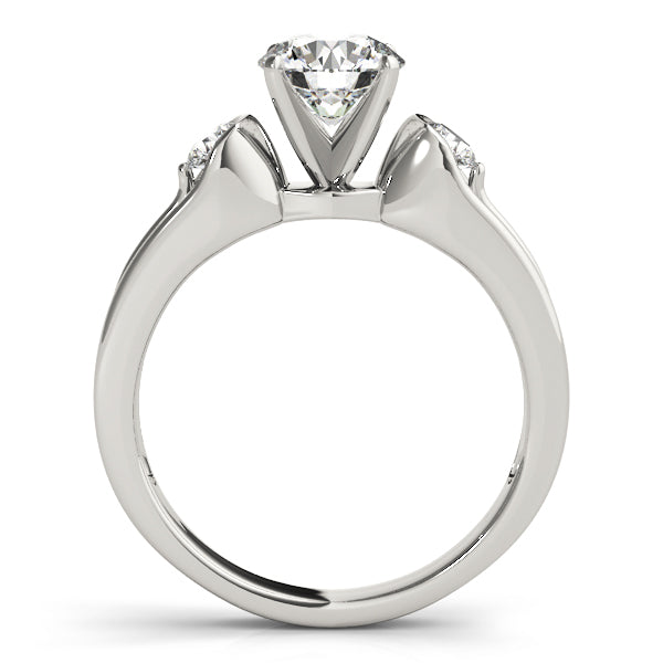 Round Three-Stone Diamond Engagement Ring · 0.20 ct tw
