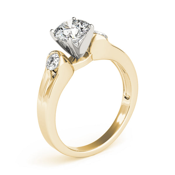 Round Three-Stone Diamond Engagement Ring · 0.20 ct tw