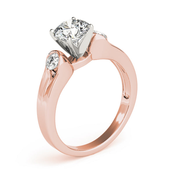 Round Three-Stone Diamond Engagement Ring · 0.20 ct tw
