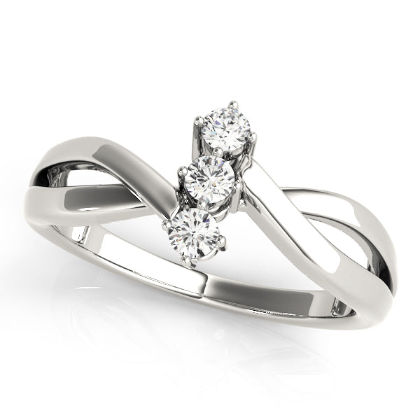 Round Three-Stone Diamond Engagement Ring · 0.09 ct tw