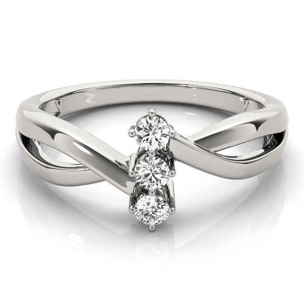 Round Three-Stone Diamond Engagement Ring · 0.09 ct tw