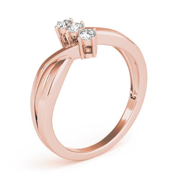 Round Three-Stone Diamond Engagement Ring · 0.09 ct tw