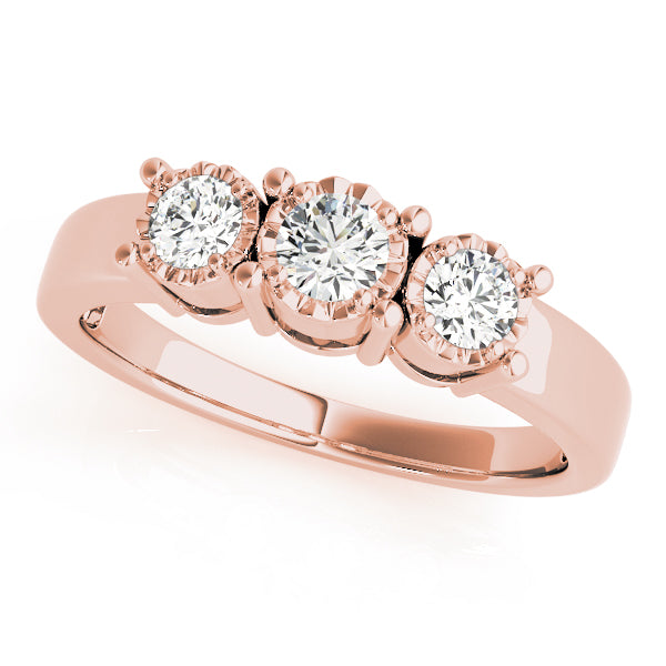 Round Three-Stone Diamond Engagement Ring · 0.24 ct tw