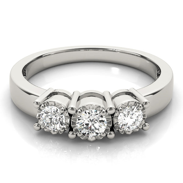 Round Three-Stone Diamond Engagement Ring · 0.24 ct tw