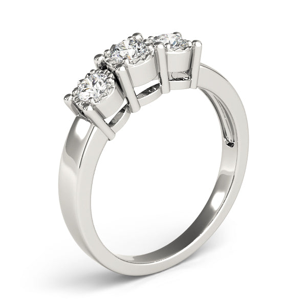 Round Three-Stone Diamond Engagement Ring · 0.24 ct tw