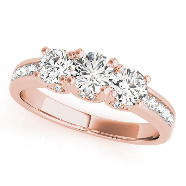 Round Three-Stone Diamond Engagement Ring · 0.98 ct tw