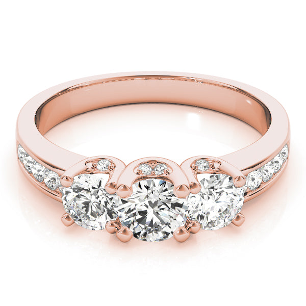 Round Three-Stone Diamond Engagement Ring · 0.49 ct tw