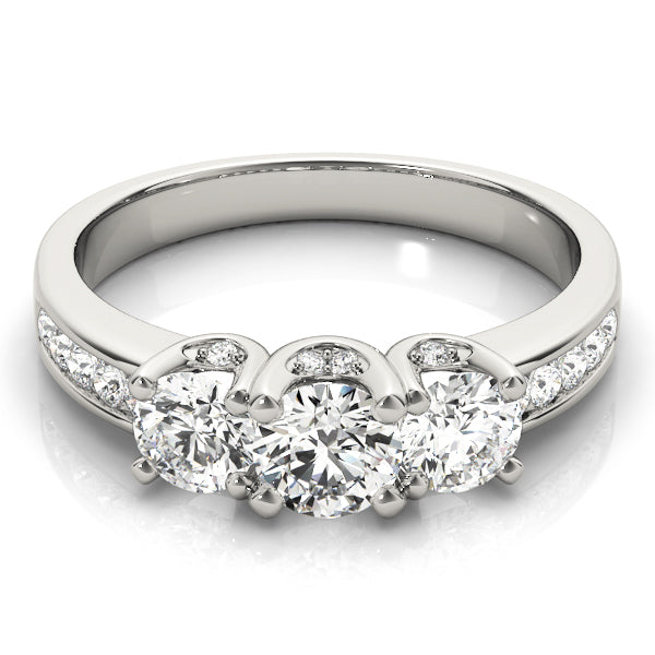 Round Three-Stone Diamond Engagement Ring · 0.49 ct tw