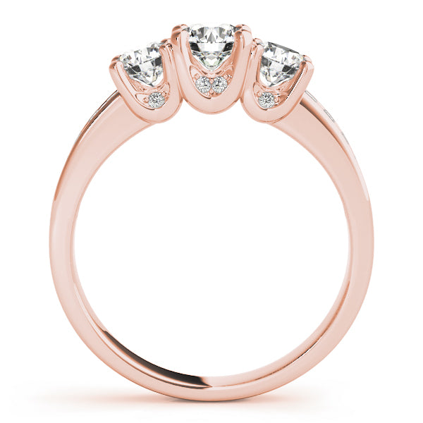 Round Three-Stone Diamond Engagement Ring · 0.49 ct tw