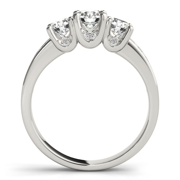 Round Three-Stone Diamond Engagement Ring · 0.49 ct tw