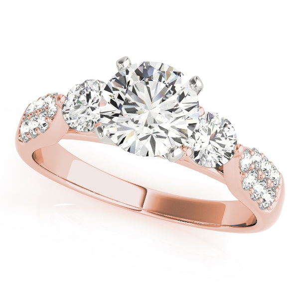 Round Three-Stone Diamond Engagement Ring · 0.51 ct tw