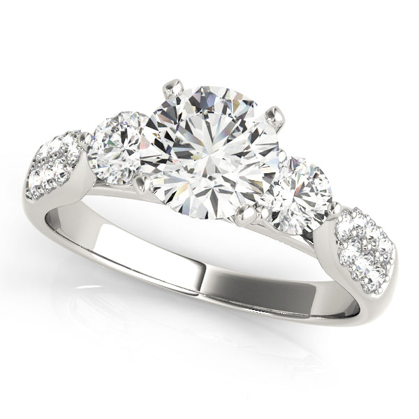 Round Three-Stone Diamond Engagement Ring · 0.51 ct tw