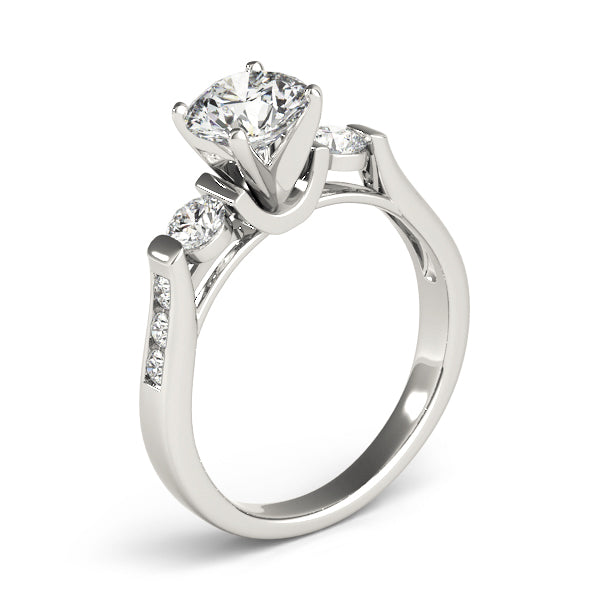 Round Three-Stone Diamond Engagement Ring · 0.42 ct tw