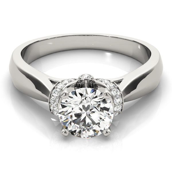 Diamond Solitaire Engagement Ring · 0.12 ct tw