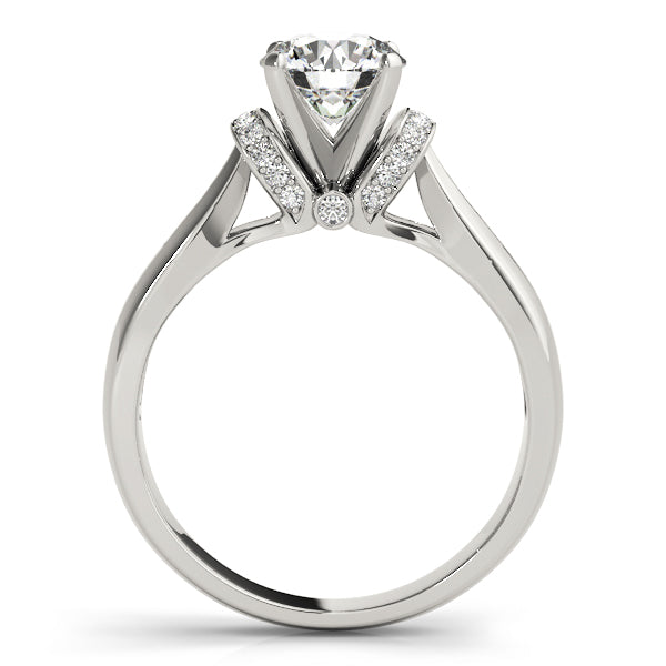 Diamond Solitaire Engagement Ring · 0.12 ct tw