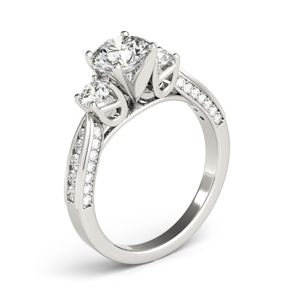 Round Three-Stone Diamond Engagement Ring · 0.65 ct tw